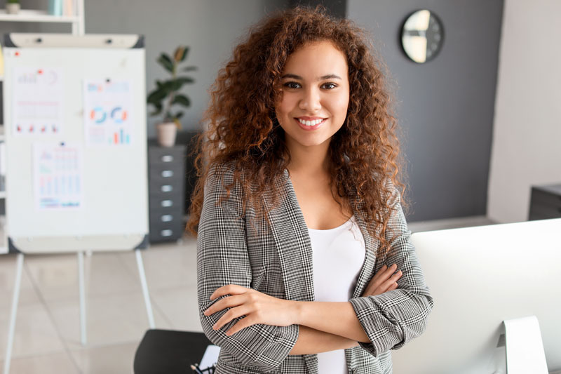 professional woman with folded arms