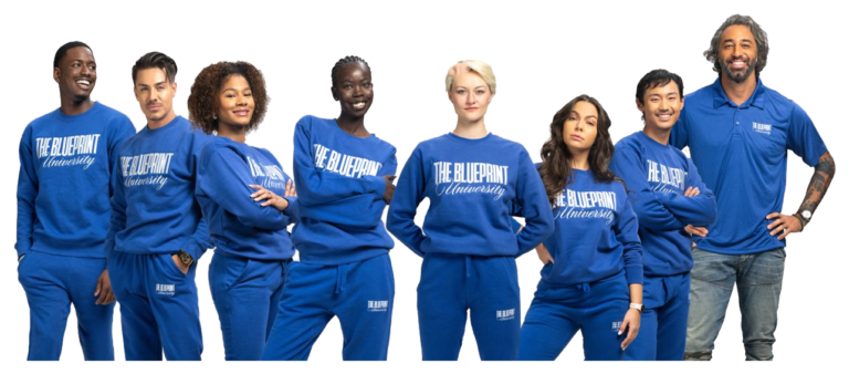 group of people posing in blueprint university shirts