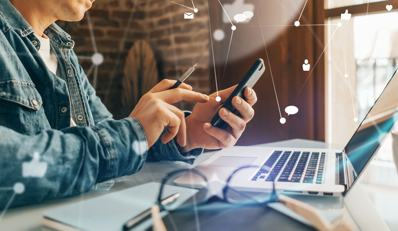 social media phone in hand